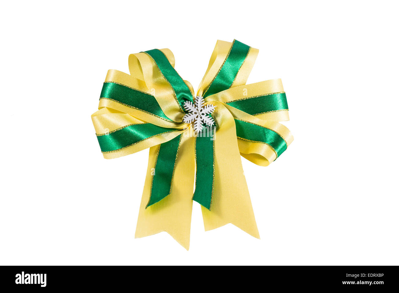 Verde e giallo ribbon colore con cristalli di neve a livello centrale su sfondo bianco Foto Stock