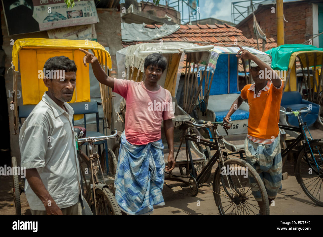 In rickshaw driver in Tamluk, Bengala occidentale. Foto Stock