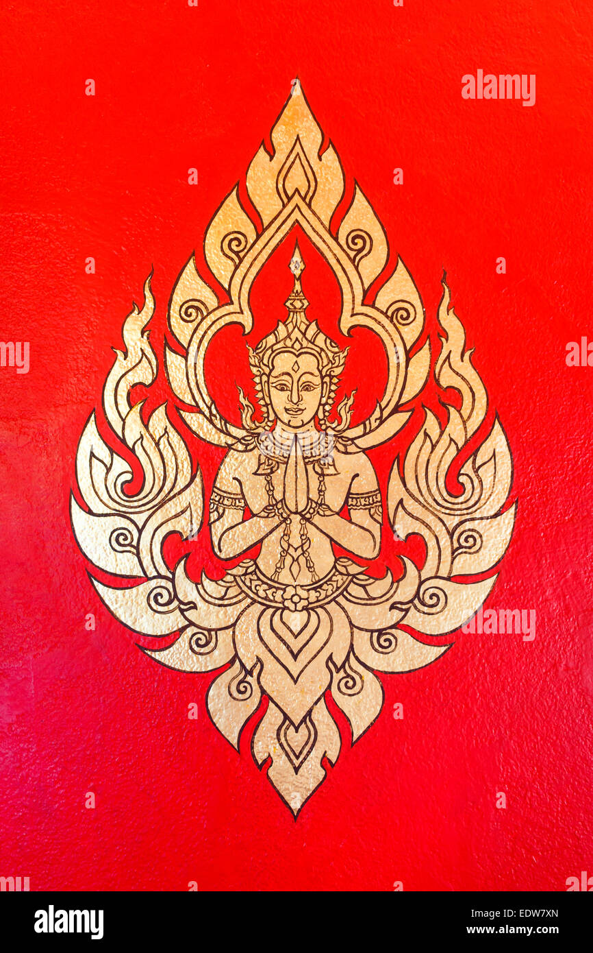 Pittura tailandese sul tempio della parete in Thailandia (maschio angel design) Foto Stock