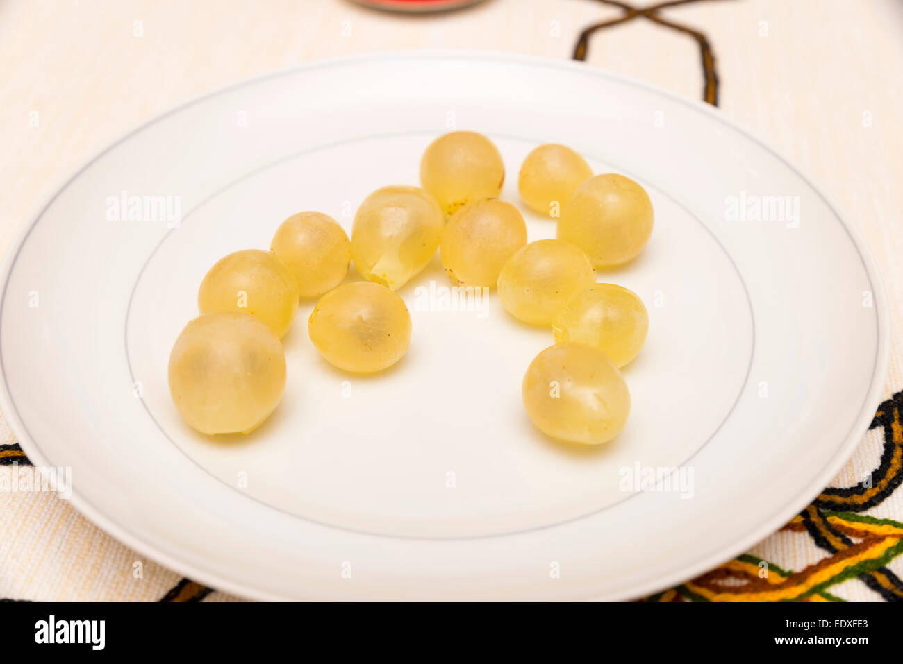Giallo pila di molto dolci uve Foto Stock