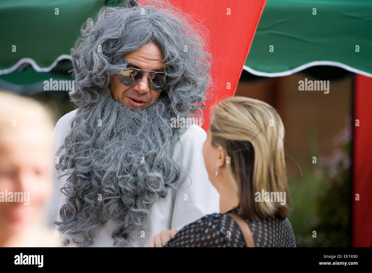 Uomo in fancy dress costume come Nettuno. Foto Stock