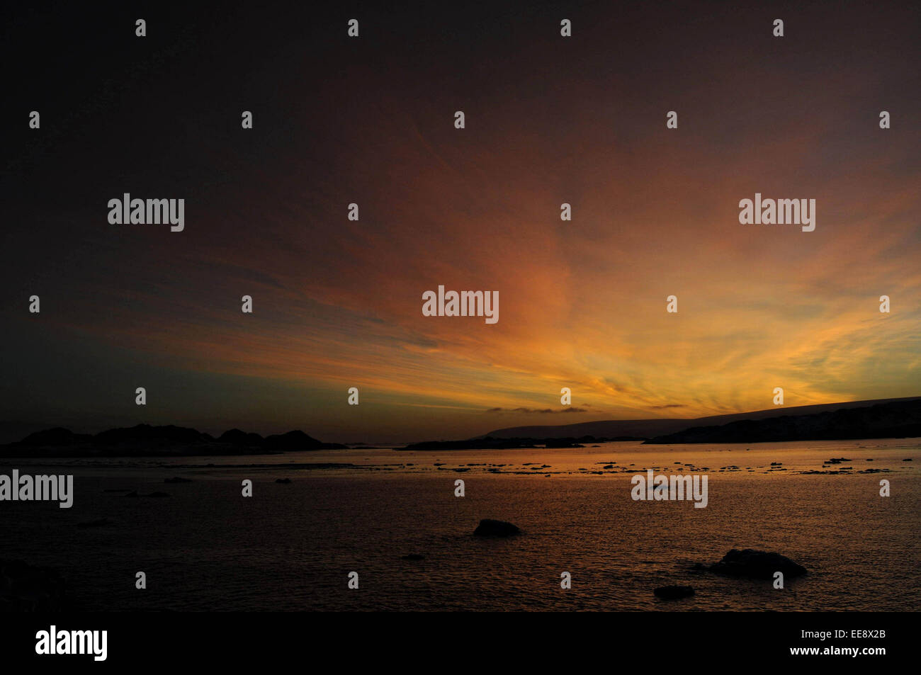 Tramonto a Palmer Station due giorni prima del primo giorno di inverno australe. In questa data il sole tramontava intorno a 2 p.m. e salita al 10:30 a.m. Palmer Station si trova a 64 gradi, 46 minuti a sud dell'equatore. Foto Stock