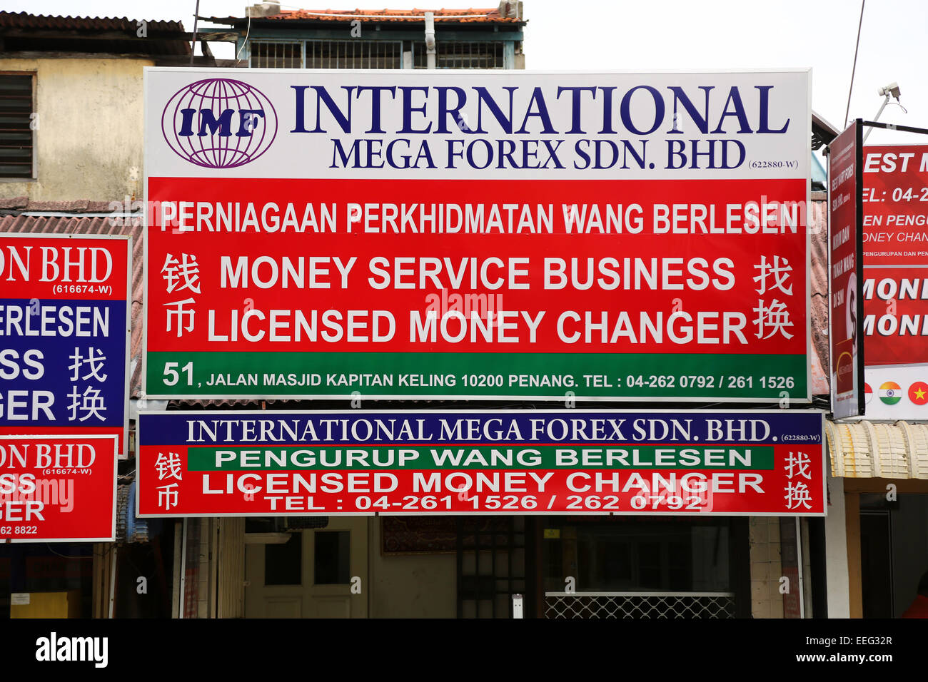 Segno per una international money changer, Georgetown, Penang, Malaysia Foto Stock