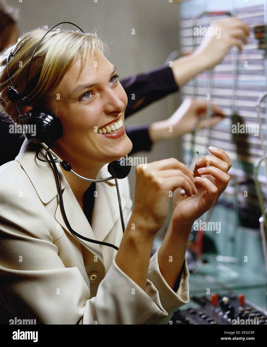 Amburgo, Deustchland, operatore telefonico con cuffia Foto Stock