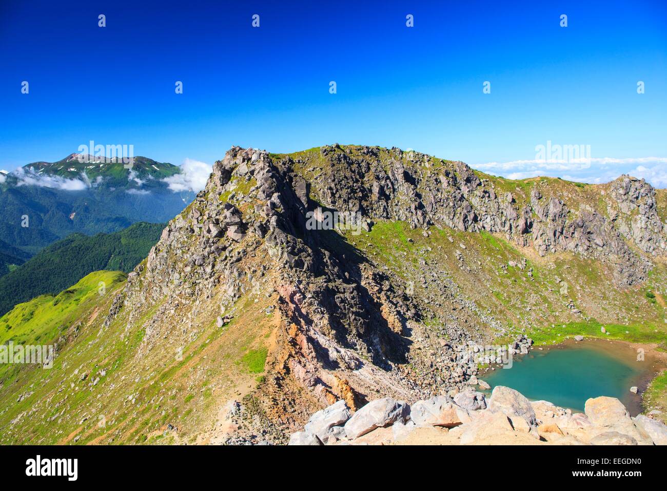 Il cratere del lago di Mt. Yakedake, Giappone Alpi Foto Stock