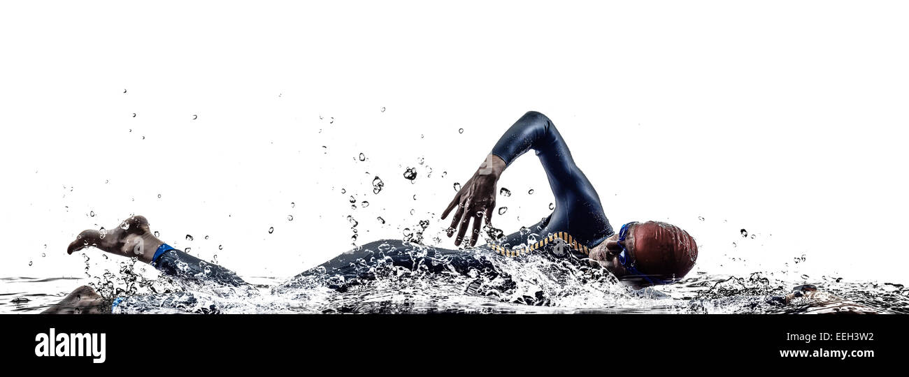 L'uomo triathlon iron man atleta nuotatori nuoto in silhouette su sfondo bianco Foto Stock