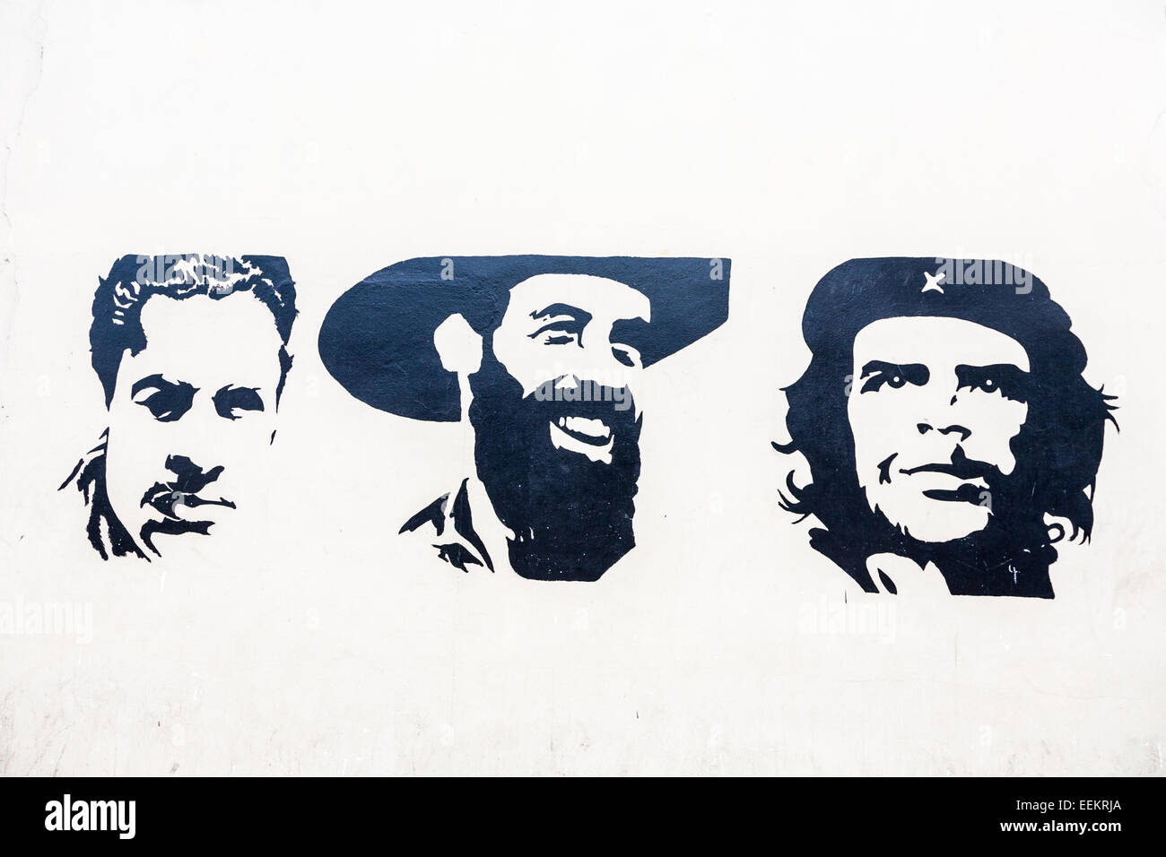 Rivoluzione cubana hero rivoluzionari i leader politici e Julio Antonio Mella, Camilo Cienfuegos e Che Guevara dipinta su un muro a l'Avana, Cuba Foto Stock