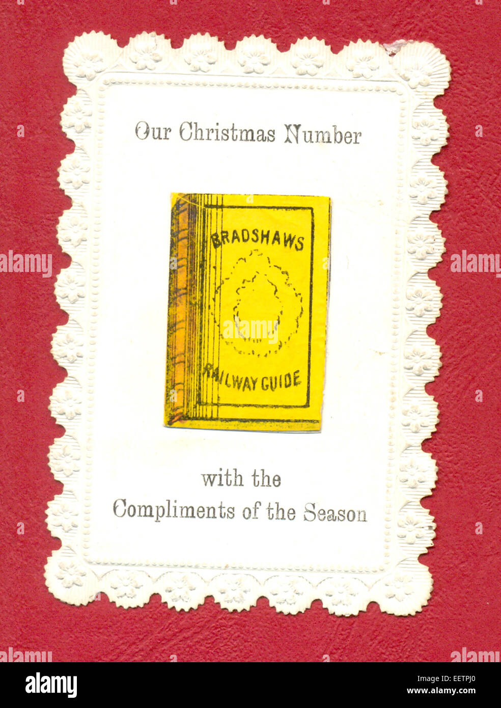Victorian greeting card con i laici che mostra Bradshaw della stazione ferroviaria di guida Foto Stock