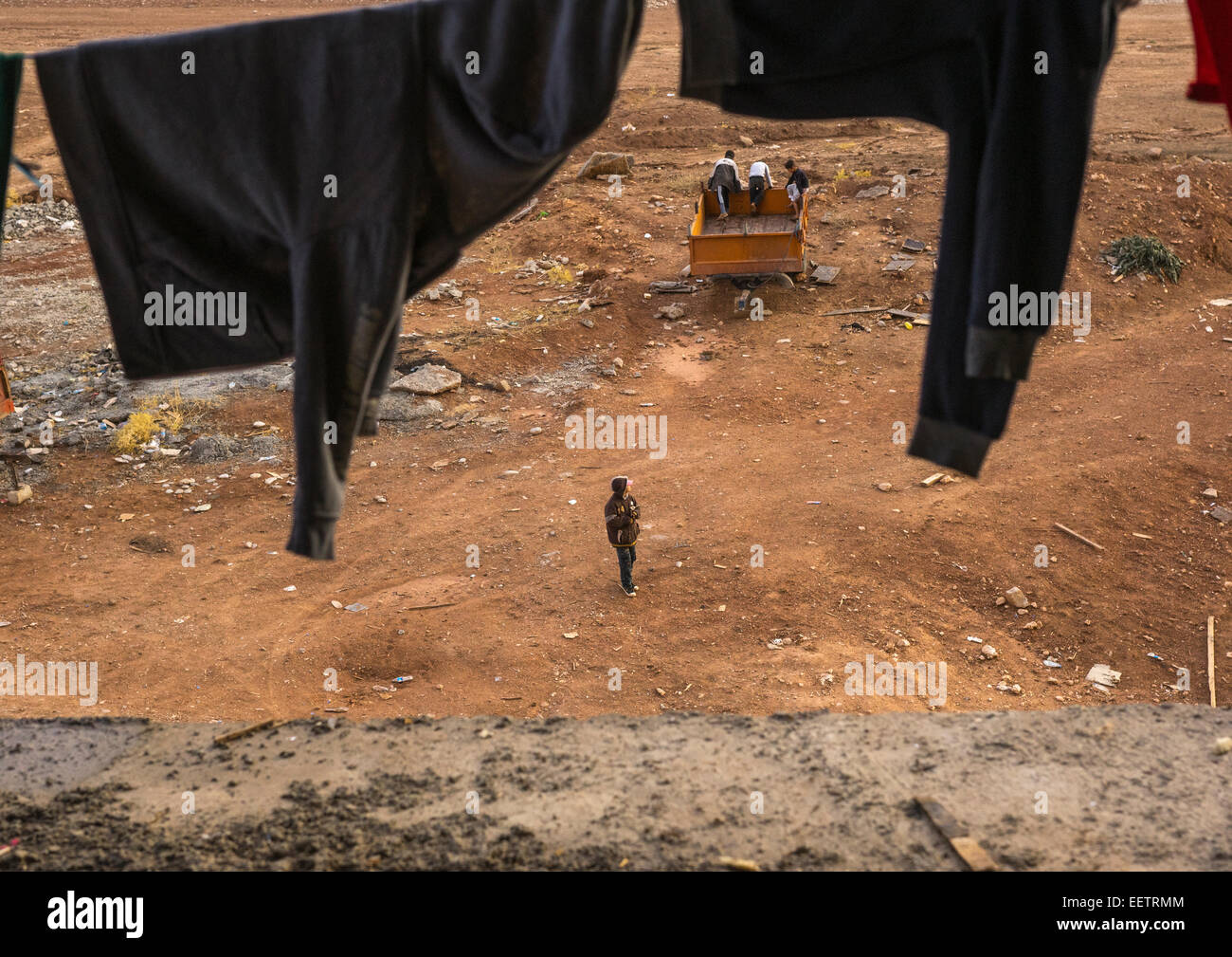 Yazidi profughi da Sinjar vivono in un in costruzione edificio, Duhok, Kurdistan, Iraq Foto Stock