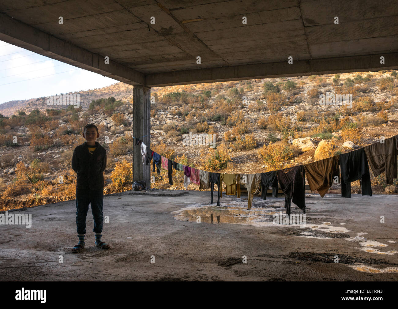 Yazidi profughi dal Sinjar vivono in un in costruzione edificio, Duhok, Kurdistan, Iraq Foto Stock