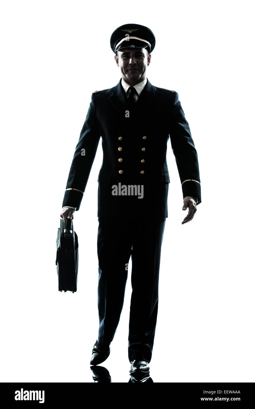Un uomo caucasico di pilota di linea uniforme in studio isolato su sfondo bianco Foto Stock