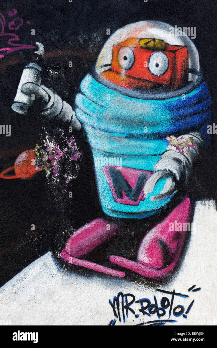 Robot in una tuta spaziale, tenendo bomboletta spray in mano, murale, Arte di strada, Duisburg, Nord Reno-Westfalia, Germania Foto Stock