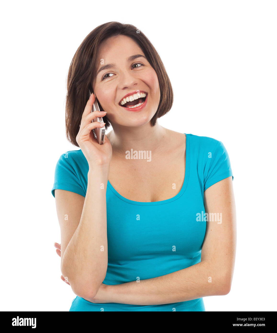 Bella ragazza ridere sul telefono, isolato su bianco Foto Stock