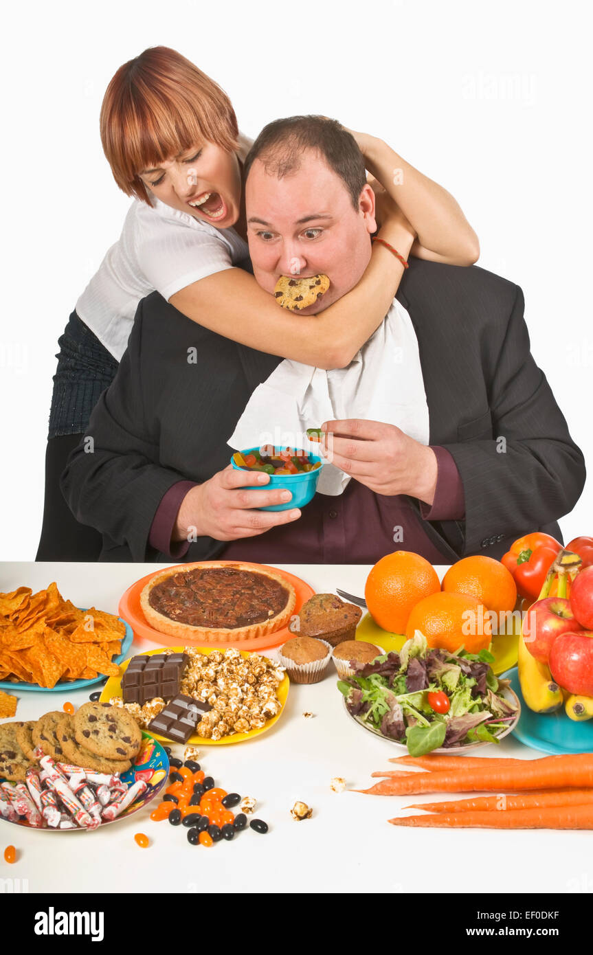 Donna cerca di fermare l'uomo da surriscaldamenti Foto Stock
