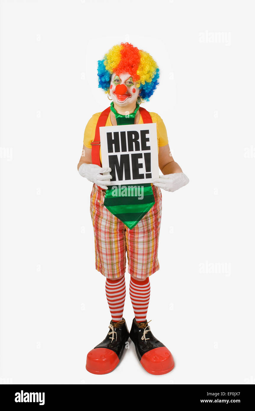 Clown tenendo un noleggio di me! Segno Foto Stock