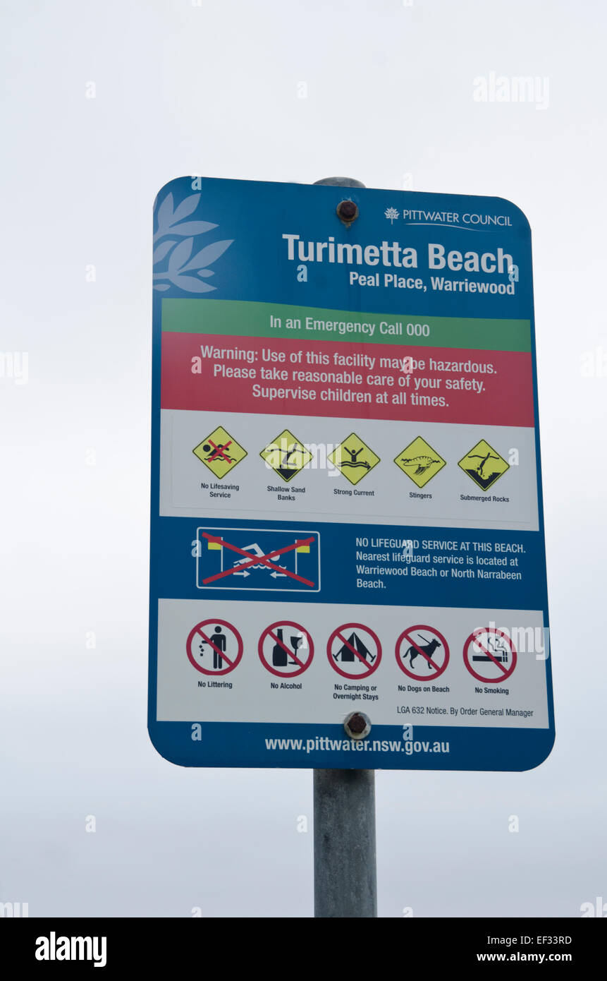 Turimetta Beach,Warriewood. parte di testa Narrabeen riserva acquatica.segno indicante i pericoli. Foto Stock