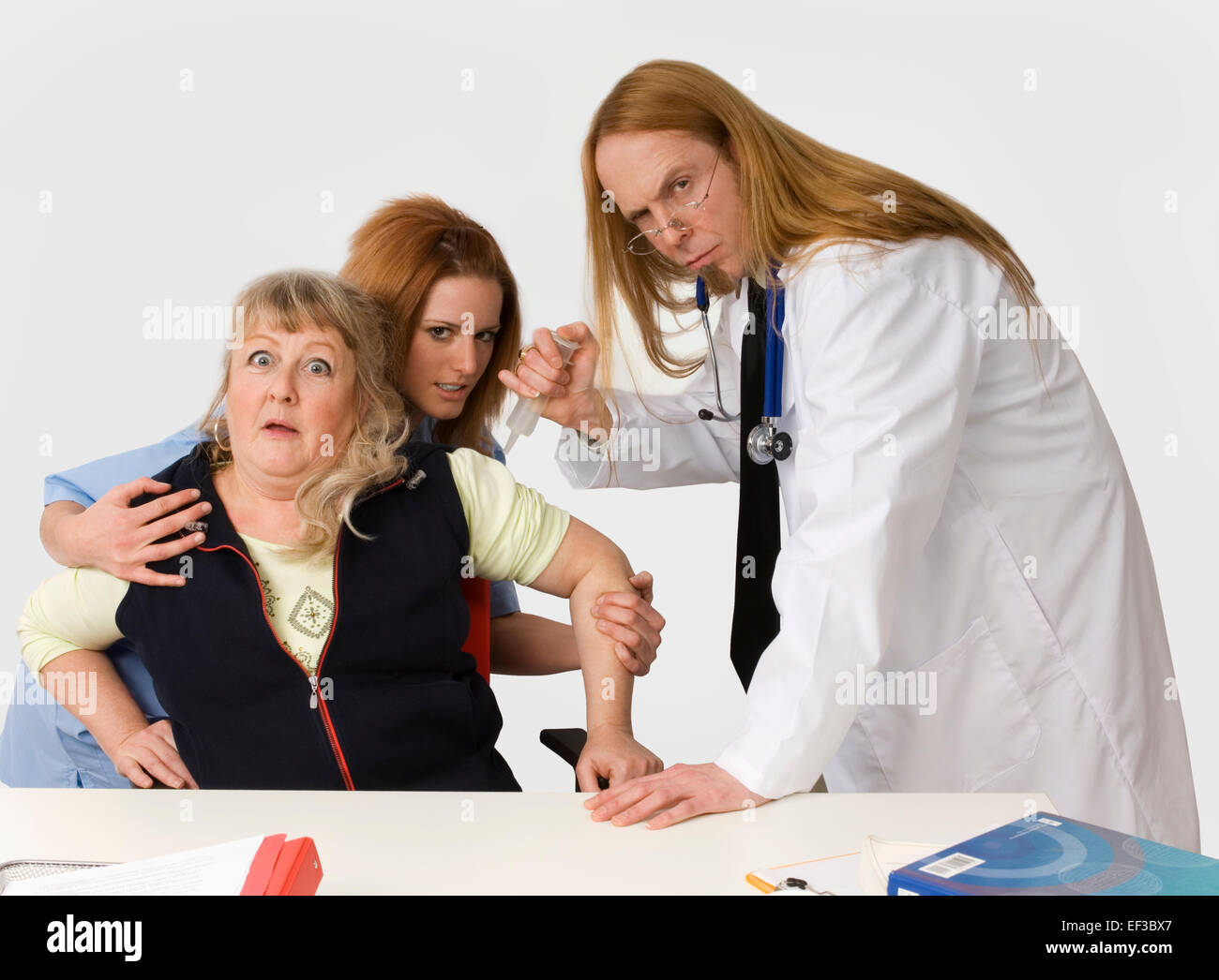 Crazy cercando medico infermiere e paziente Foto Stock