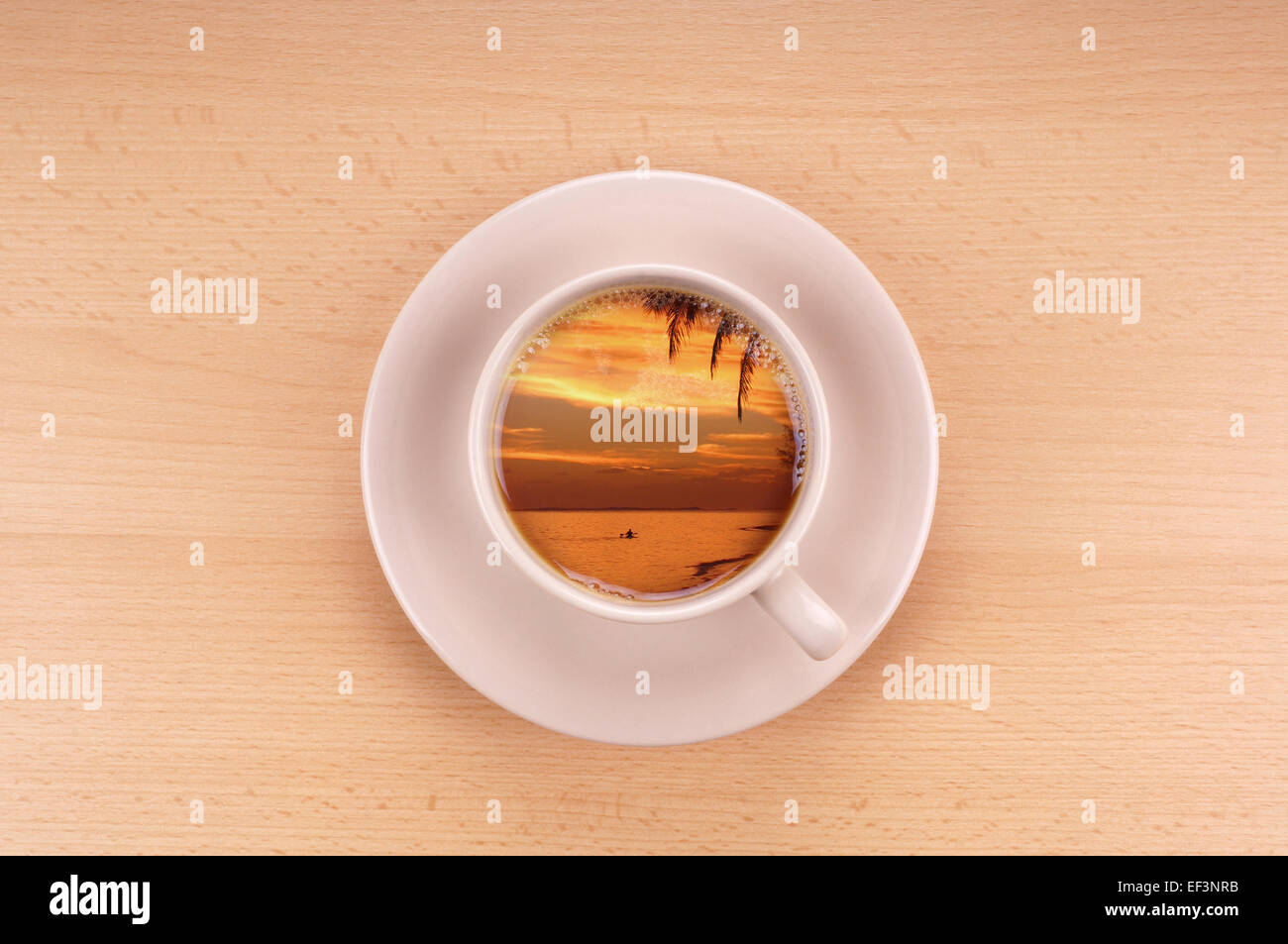 Il tramonto in una tazza di caffè Foto Stock