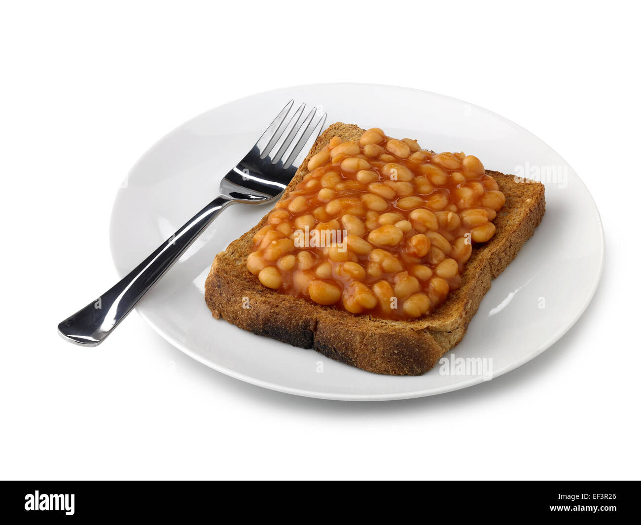 Fagioli al forno su bown toast Foto Stock