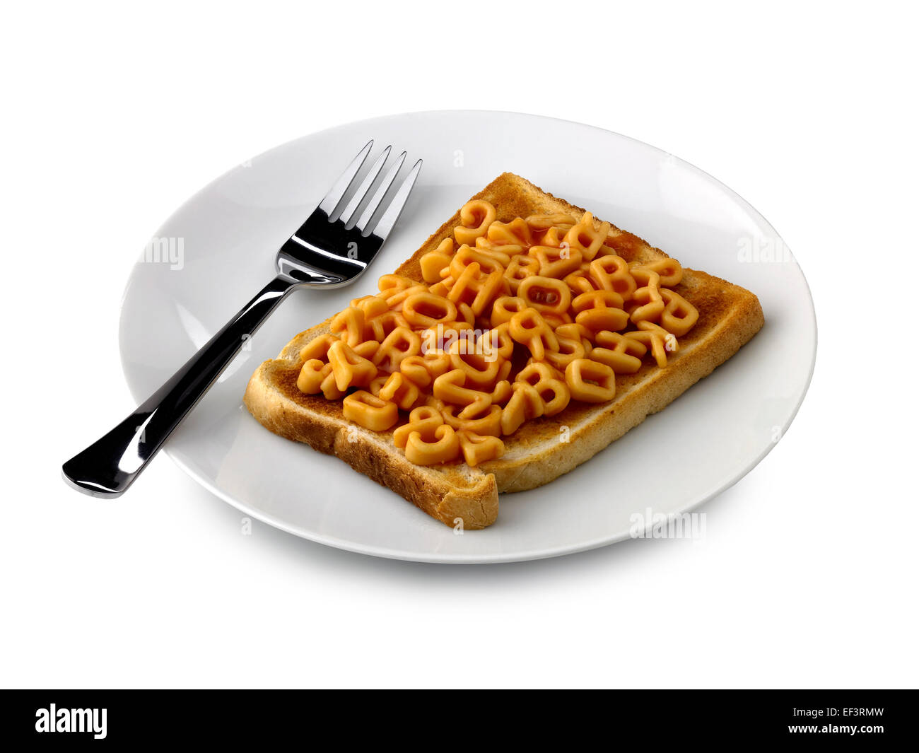 Alfabeto spaghetti su pane tostato Foto Stock
