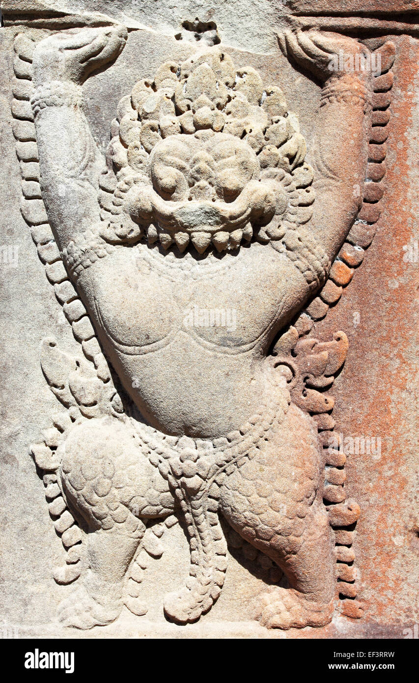 Antichi khmer scultura in pietra ad Angkor in Cambogia Foto Stock