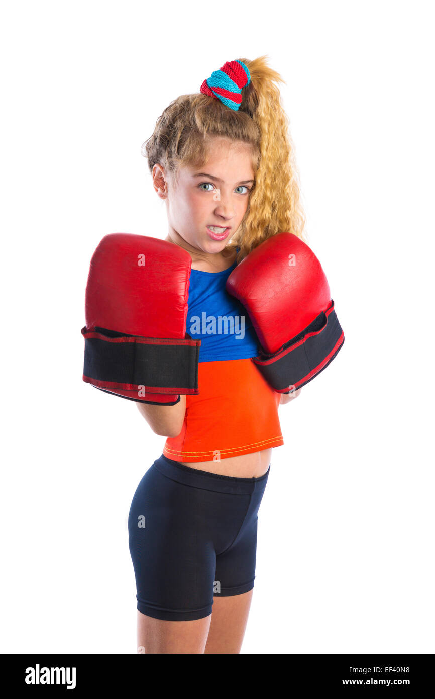 Boxer kid ragazza bionda divertente con i guantoni scherzando aggressiva espressione gesto Foto Stock