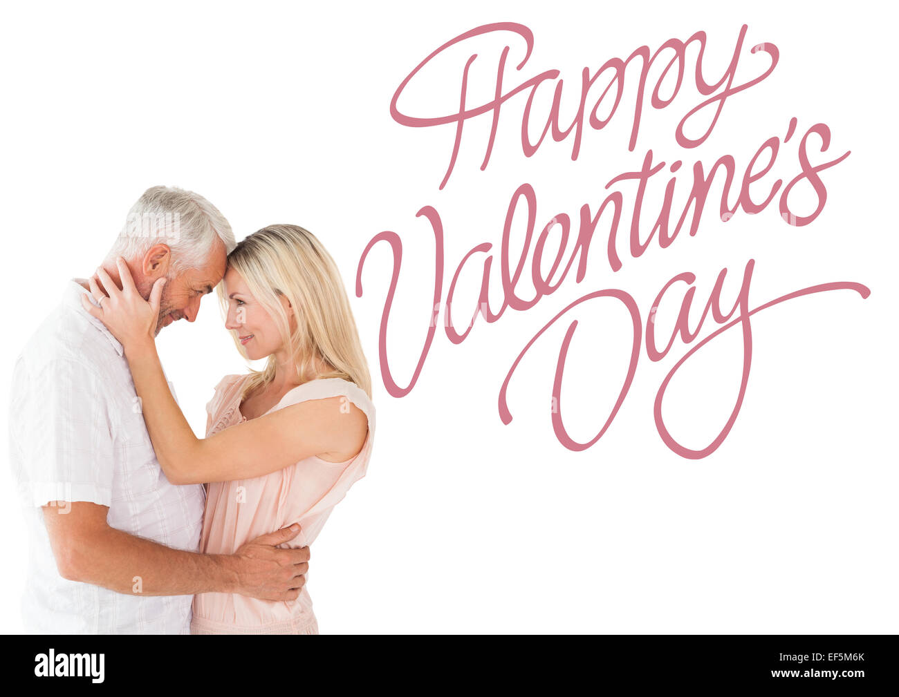 Immagine composita di affettuosa giovane in piedi e abbracciando Foto Stock