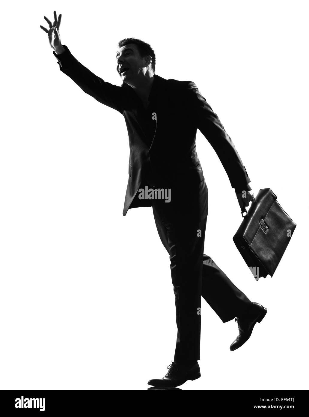 Silhouette caucasian business man in esecuzione salutando a lunghezza piena su studio isolato sfondo bianco Foto Stock