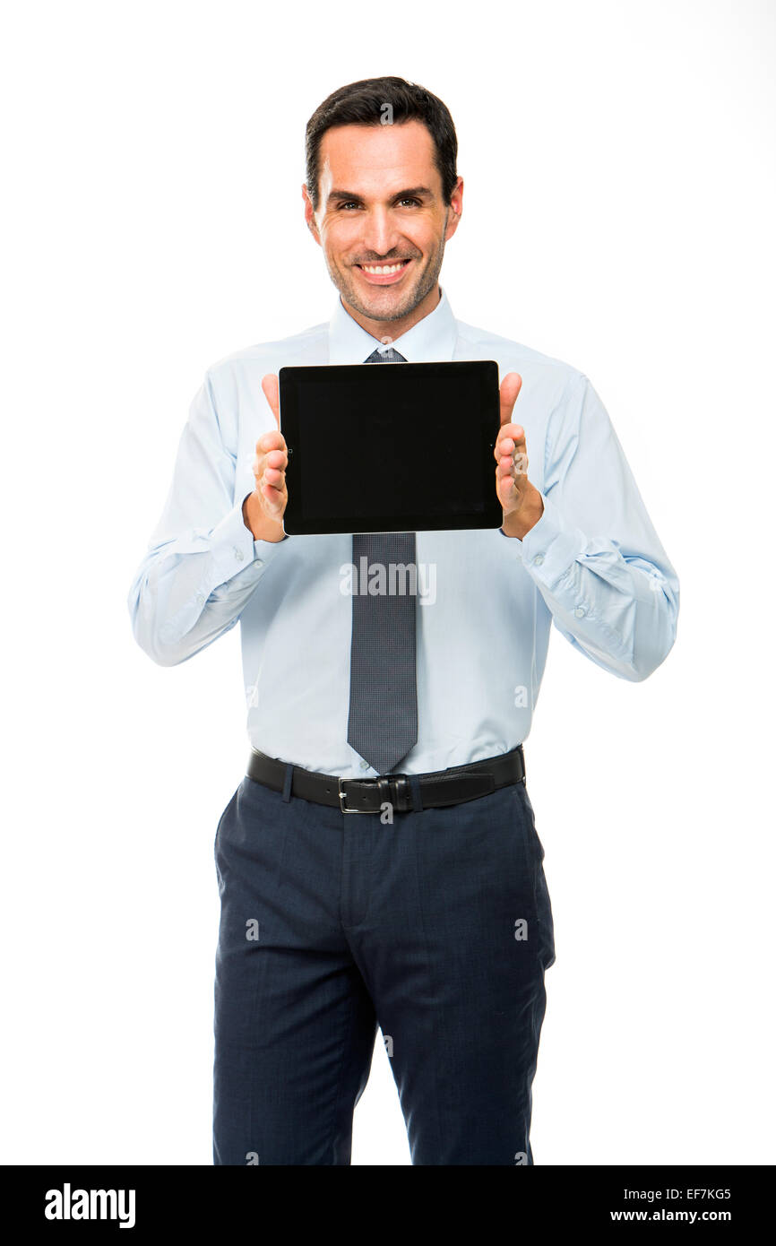 Mezza lunghezza Ritratto di un imprenditore sorridente con tavoletta digitale Foto Stock