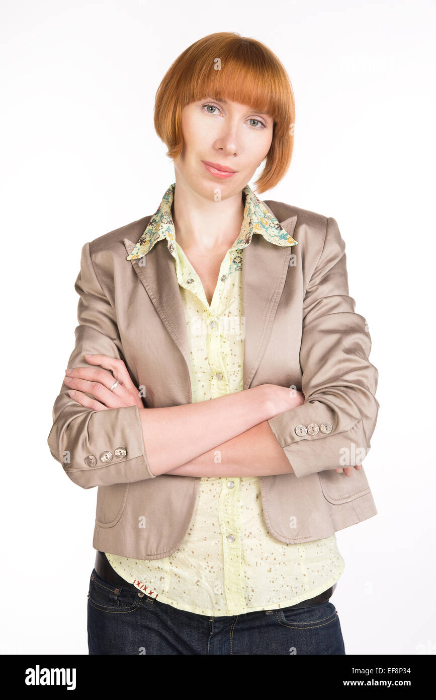 Giovane donna con bracci incrociati Foto Stock