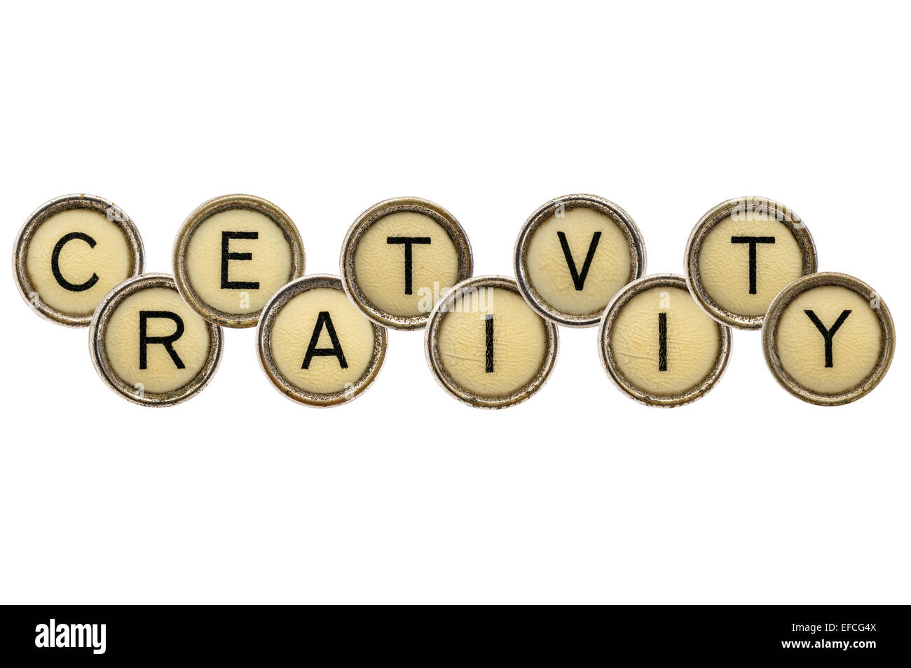 La creatività di word in tondo vecchio tasti di una macchina da scrivere isolato su bianco Foto Stock