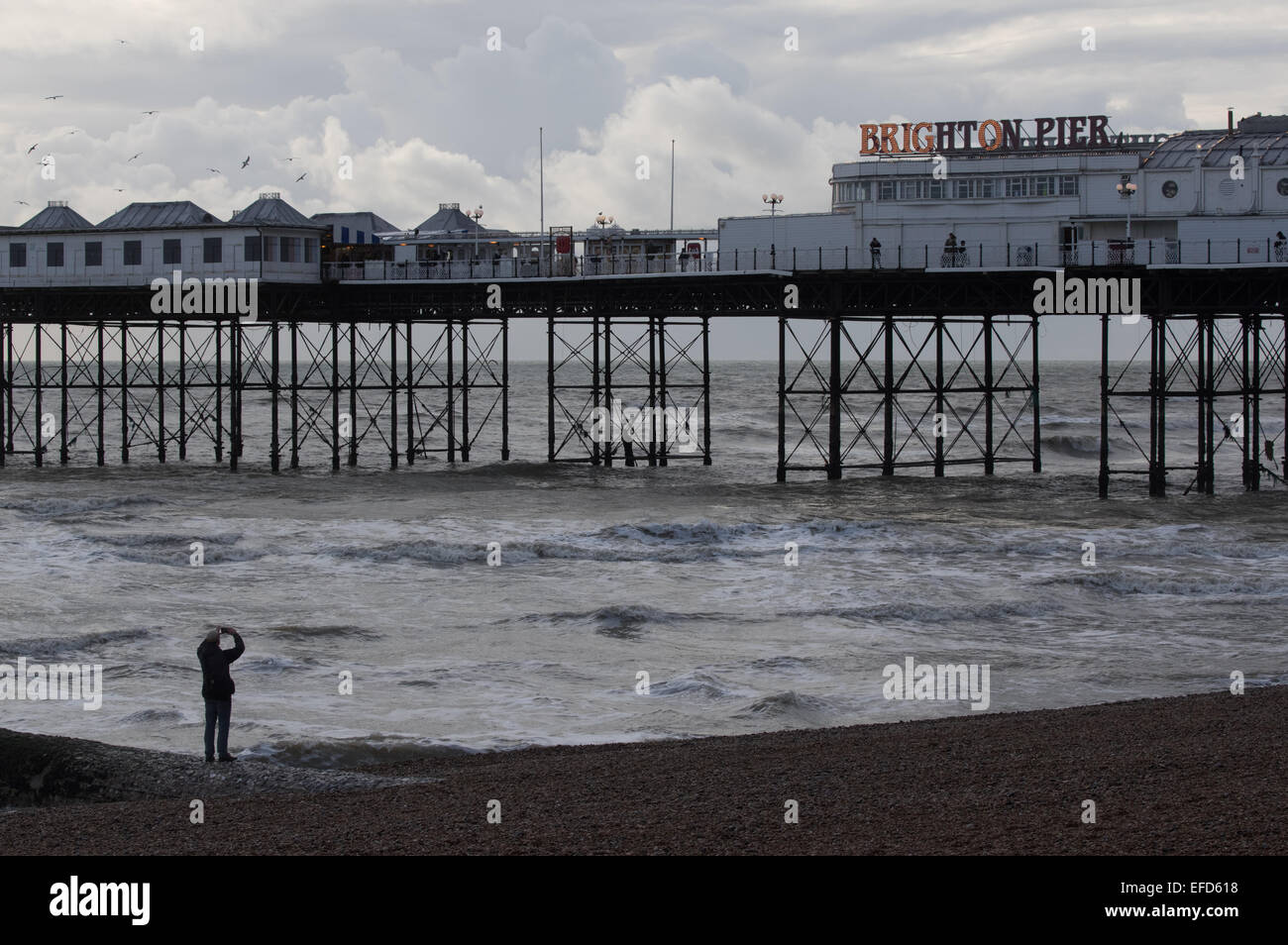 Il Brighton Pier è popolare con i fotografi, non molti sono in grado di resistere alla tentazione di scattare. Foto Stock