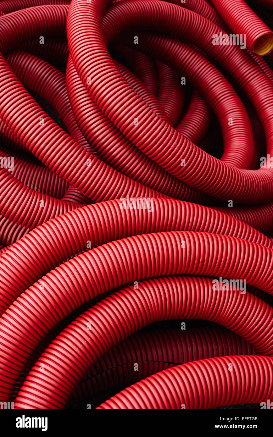 Rosso di tubi ondulati Foto Stock