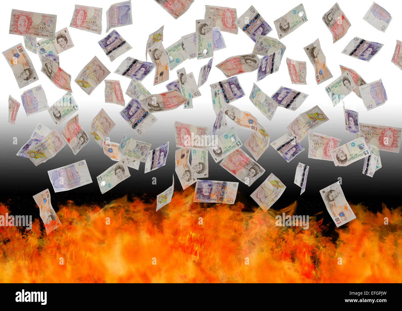 Concetto di immagine del british banconote cadere nel fuoco Foto Stock