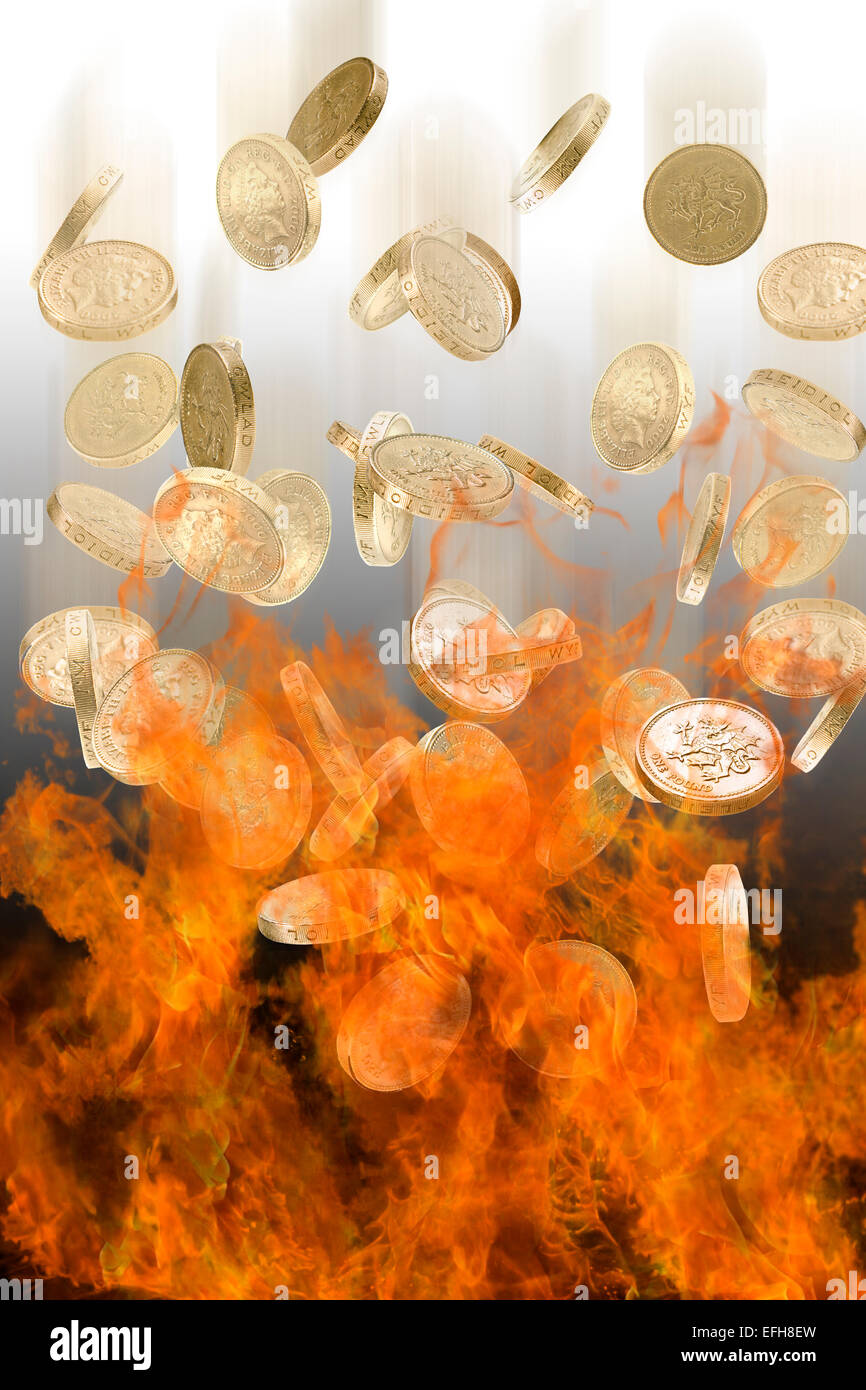 Concetto di immagine del british uk denaro monete cadere in fiamme Foto Stock