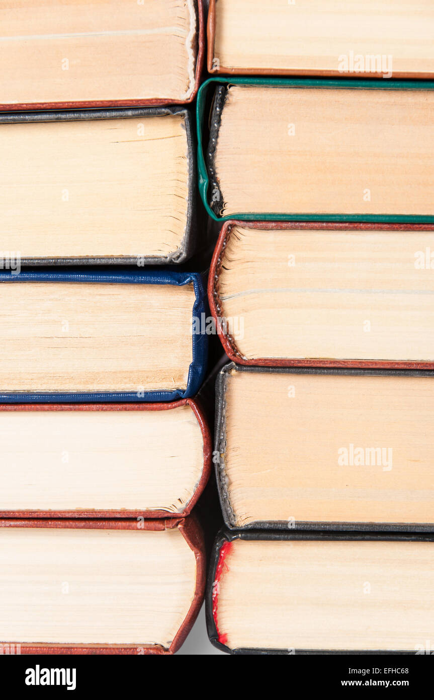 Abstract sfondo è di vecchi libri radici impilati gli uni agli altri Foto Stock