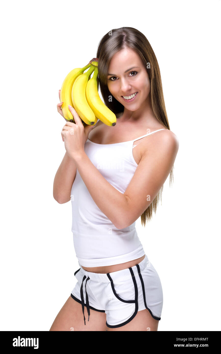 Una Ragazza Sbalorditiva Che Si Diverte Con Una Banana Gonfiabile. Su  Sfondo Bianco Nello Studio. Fotografia Stock - Immagine di divertimento,  brunetta: 177626428