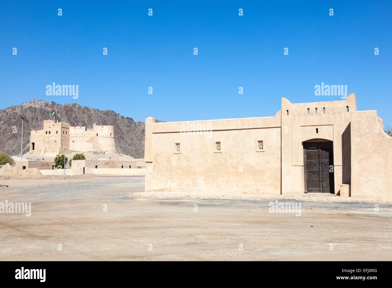 Storico forte ed il villaggio del patrimonio culturale in Fujairah, Emirati Arabi Uniti Foto Stock