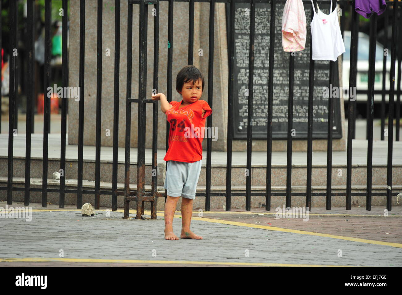 Straßenkind a Manila, Philippinen. Foto Stock