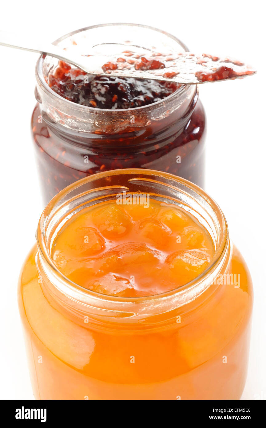 Confettura di pesche e confettura di lamponi Foto Stock