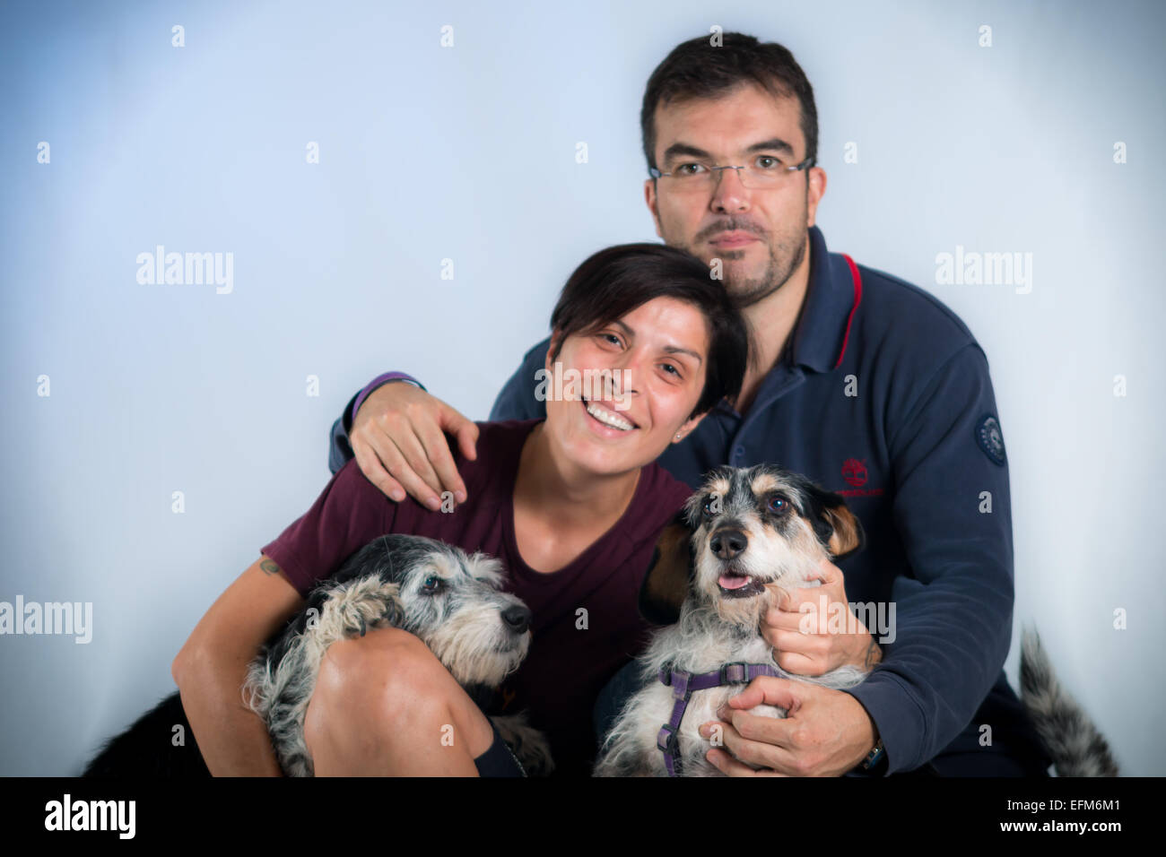 Famiglia con i cani Foto Stock