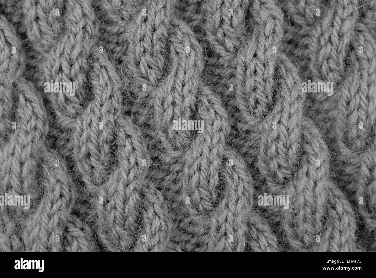 Primo piano della spirale cavo corda stitch maglia sulla diagonale - elaborazione monocromatica Foto Stock