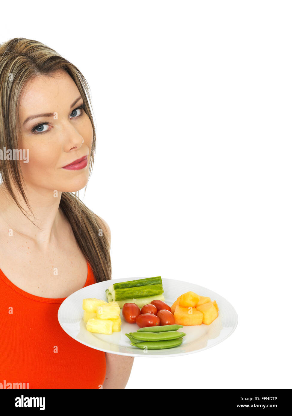 Sano giovane donna mangiare cinque al giorno Foto Stock