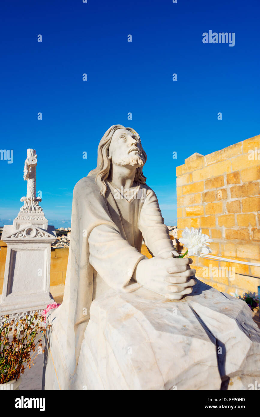 Testa di cimitero statua di pietra, Victoria (Rabat), isola di Gozo, Malta, Mediterraneo, Europa Foto Stock