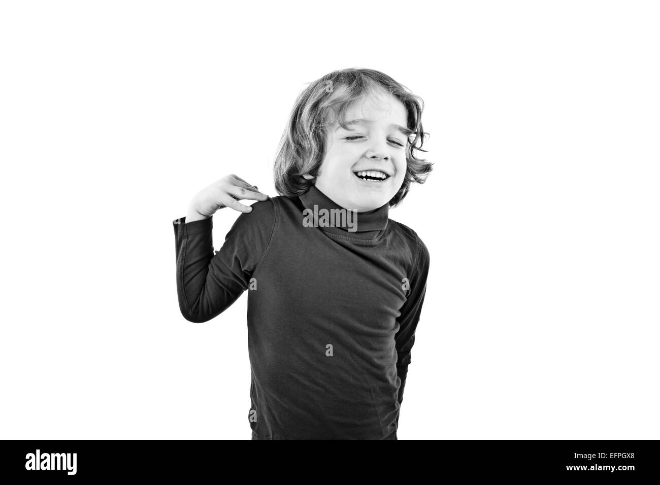 Un bambino che ride isolato Foto Stock