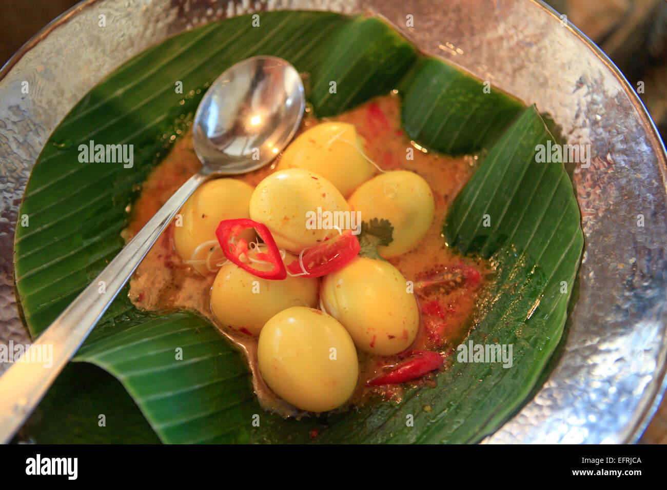 Uovo d'anatra al curry Foto Stock