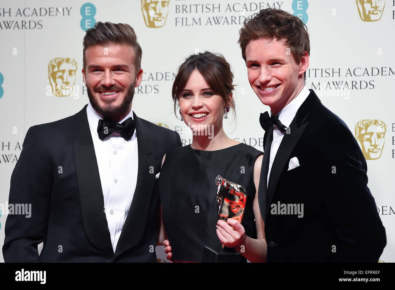 David Beckham, Felicity Jones e Eddie Redmayne presso l'EE British Academy Film Awards presso la Royal Opera House il 8 febbraio 2015 a Londra, Inghilterra. Foto Stock