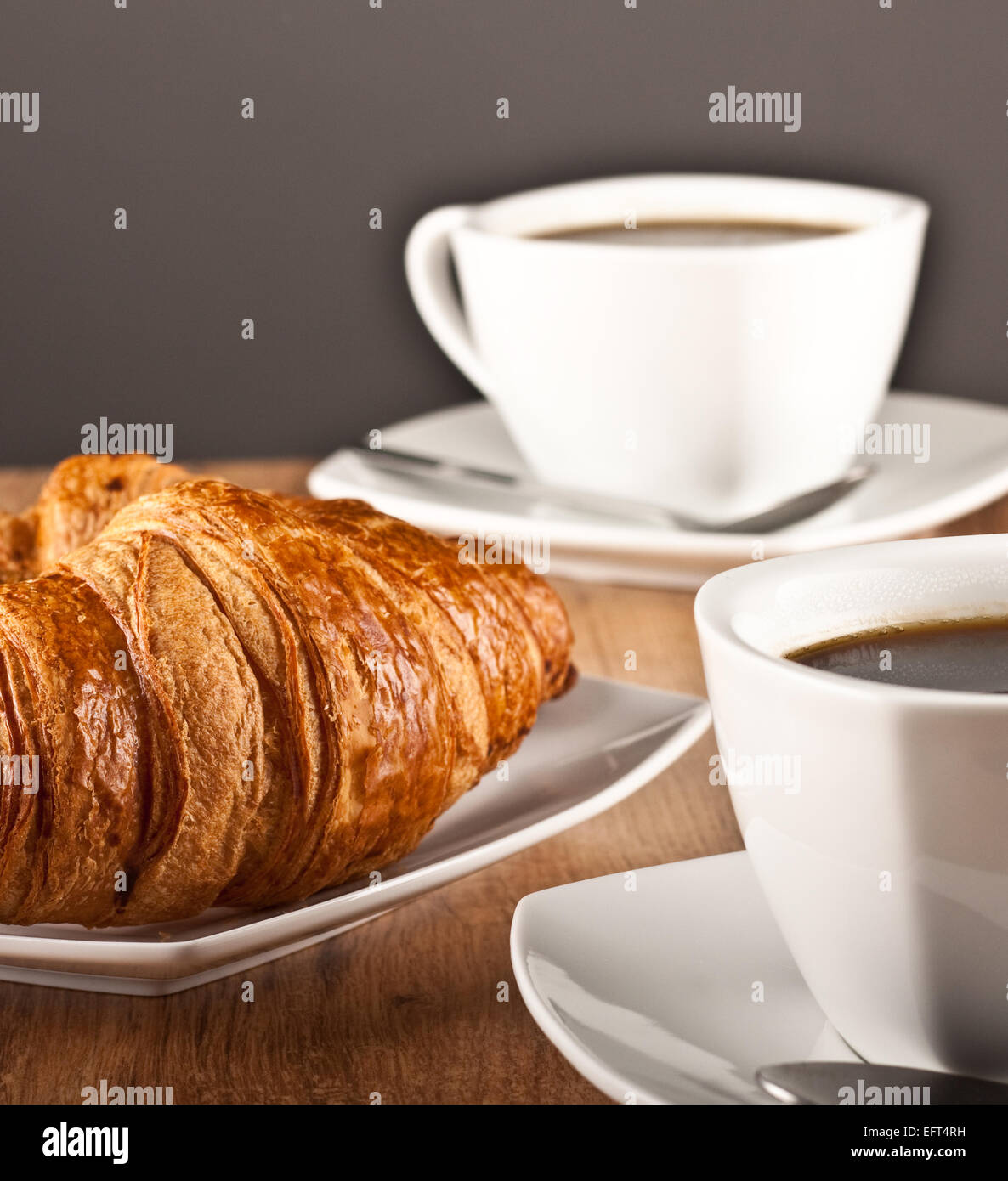 Caffè e Croissant Foto Stock