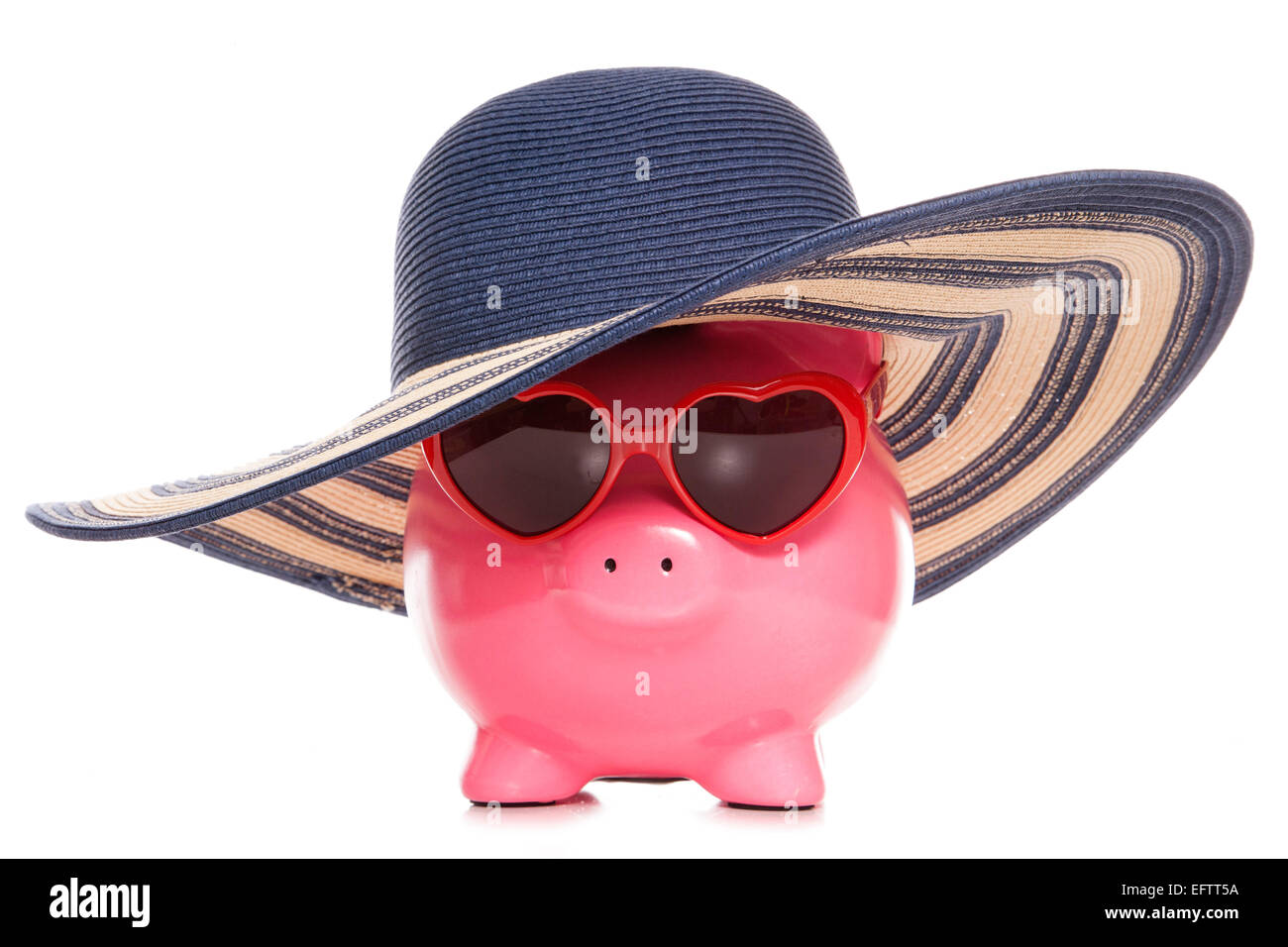 Salvadanaio indossando un cappello per il sole e occhiali da sole intaglio Foto Stock