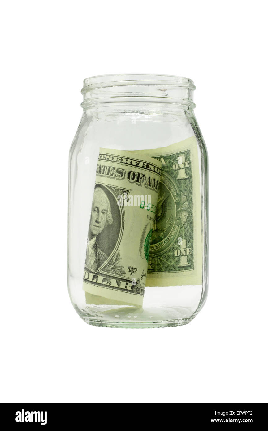 Un US Dollar Nota In aprire il vasetto di vetro su sfondo bianco Foto Stock